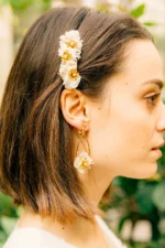 -Clip adorned with stabilized white hydrangea and gypsophila and delicate little gold metal flowers adorned with a pearl